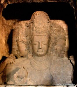 An ancient sculpture of Shiva at the Elephanta Caves, Maharashtra. 6th century CE.